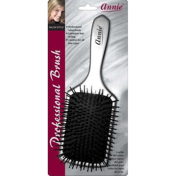 Annie professional hair brush in packaging with a woman's face on the top left corner.