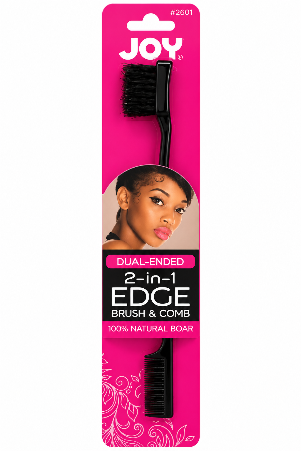 A black Joy brand 2-in-1 Edge Brush & Comb packaged on a bright pink card with a photo of a woman's face and text reading 'DUAL-ENDED 2-in-1 EDGE BRUSH & COMB 100% NATURAL BOAR'.