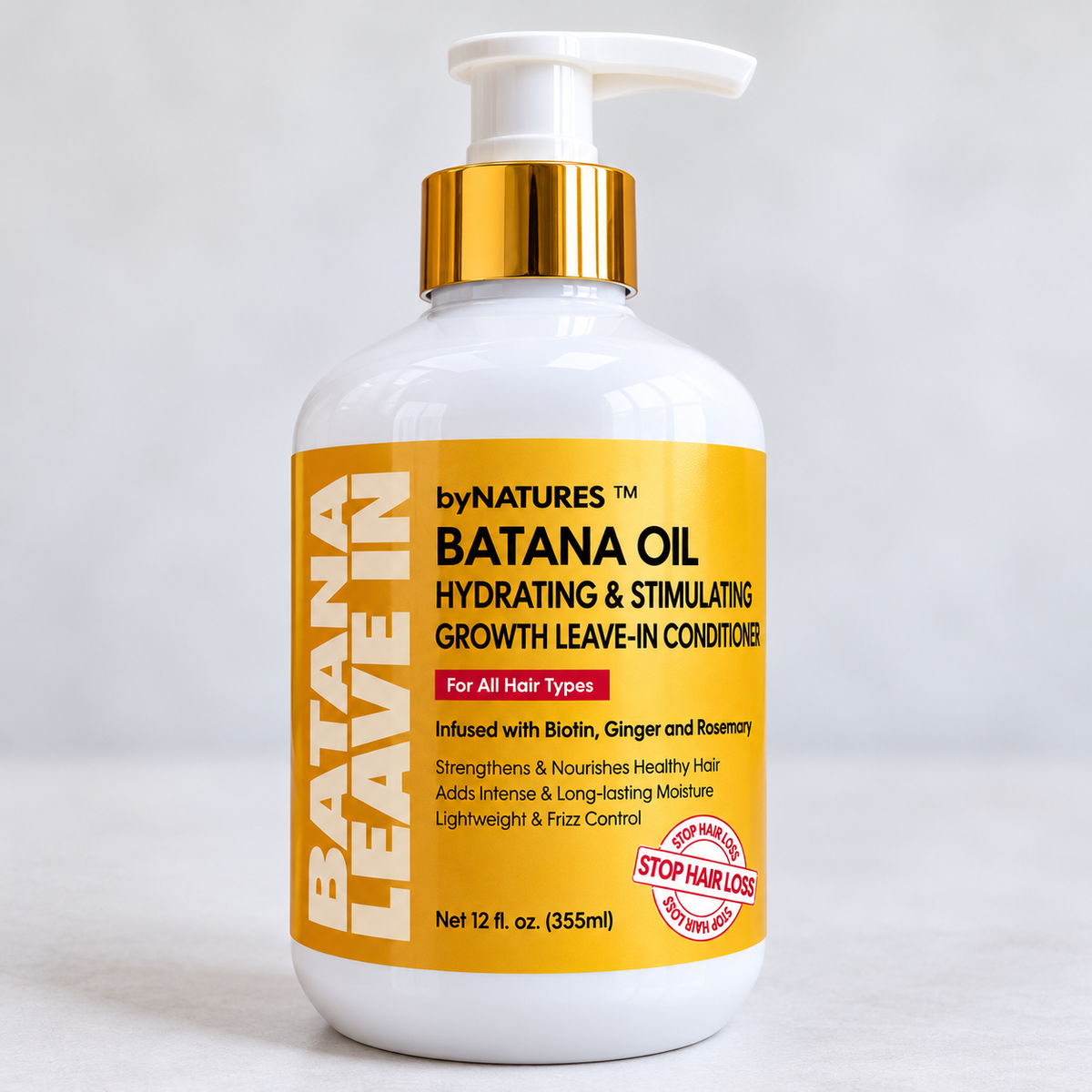 By Natures Batana Oil Hydrating Leave-In Conditioner 12 oz with a white pump bottle and gold packaging.
