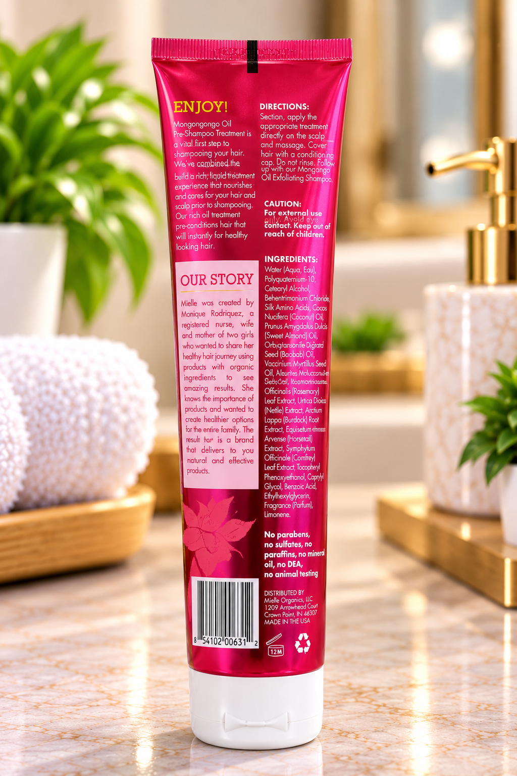 MIELLE Mongongo Oil Pre-Shampoo Treatment  shown from the back