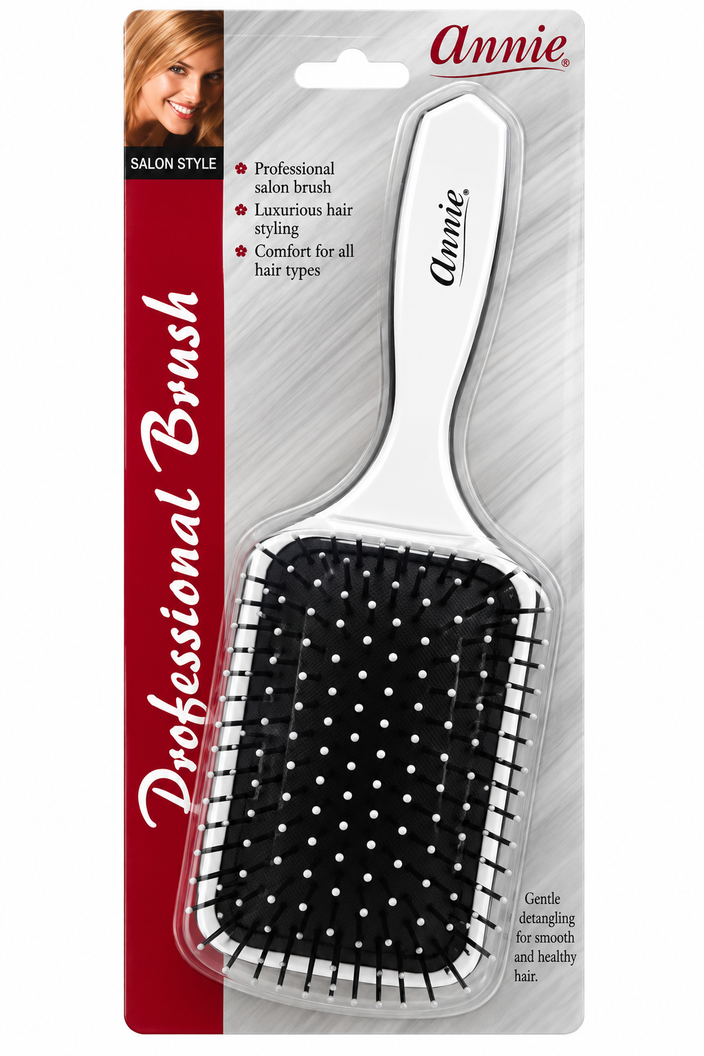 Annie Professional Brush salon styling brush in its retail blister packaging. The brush features a white handle with the brand name 'Annie' printed in black, and a black bristle pad with white dot details.