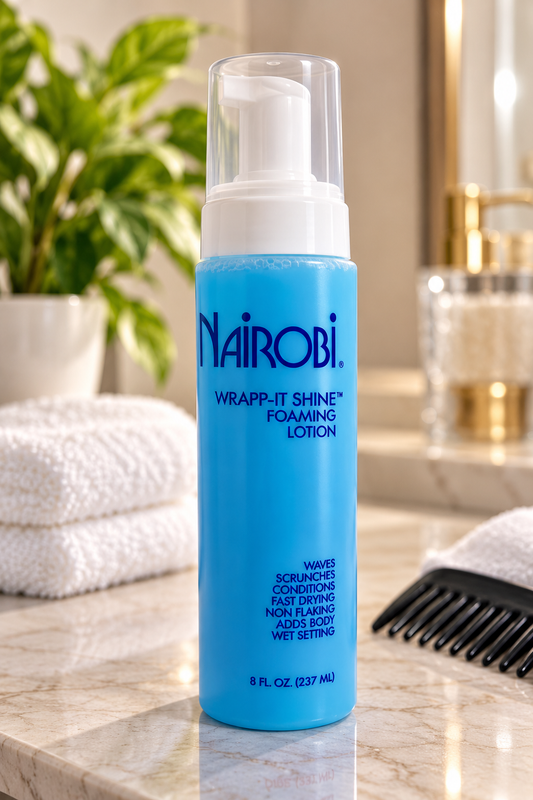 A bottle of Nairobi Wrap-It Shine Foaming Lotion. 237ml